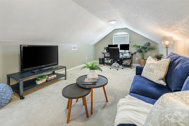 2707 Colony Creek Dr, Bryan, TX 77808 - living area with an office area, vaulted ceiling, carpet flooring, and baseboards