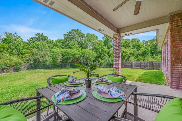 2707 Colony Creek Dr, Bryan, TX 77808 - view of patio / terrace featuring ceiling fan, outdoor dining area, and view of scattered trees