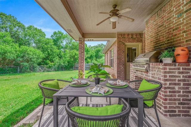 2707 Colony Creek Dr, Bryan, TX 77808 - view of patio / terrace with a ceiling fan, outdoor dining space, and view of wooded area