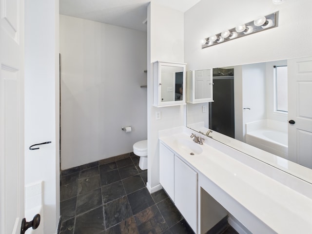 1035 Turnberry Park Ln, Spring, TX 77373 - full bath featuring a garden tub, vanity, toilet, a shower, and baseboards