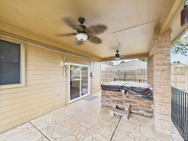 1035 Turnberry Park Ln, Spring, TX 77373 - view of patio featuring ceiling fan and exterior kitchen