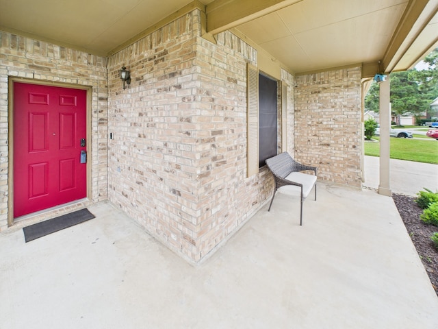 1035 Turnberry Park Ln, Spring, TX 77373 - entrance to property with a porch and brick siding
