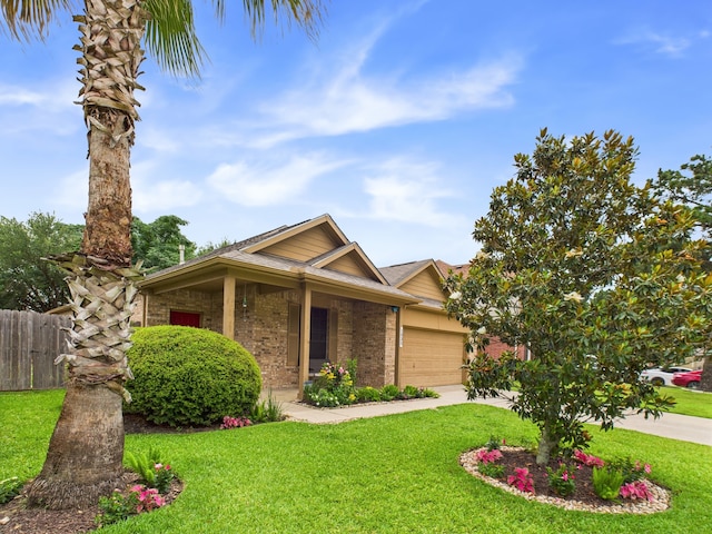 1035 Turnberry Park Ln, Spring, TX 77373 - ranch-style house with brick siding, an attached garage, and driveway