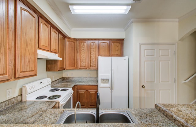 9400 Bellaire Blvd Unit 112, Houston, TX 77036 - kitchen with white appliances, under cabinet range hood, a sink, crown molding, and brown cabinets
