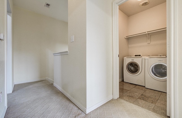 9400 Bellaire Blvd Unit 112, Houston, TX 77036 - laundry room with separate washer and dryer, carpet, and baseboards