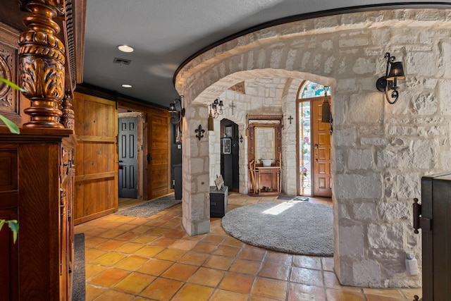 22 Indian Creek Loop, Kerrville, TX 78028 - foyer featuring arched walkways and recessed lighting