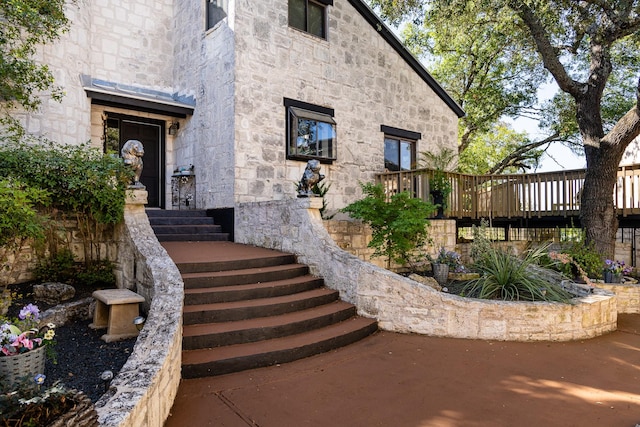 22 Indian Creek Loop, Kerrville, TX 78028 - doorway to property with stone siding