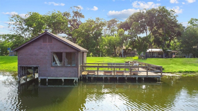 30523 Plantation Dr Unit 37, Damon, TX 77486 - dock area with a lawn and a deck with water view
