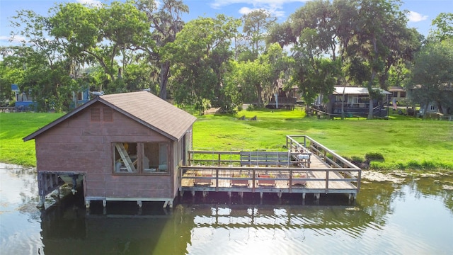 30523 Plantation Dr Unit 37, Damon, TX 77486 - dock with a lawn and a deck with water view