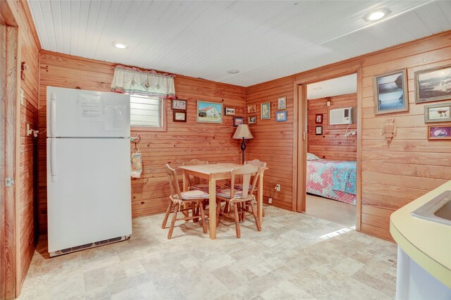 30523 Plantation Dr Unit 37, Damon, TX 77486 - dining space featuring wooden walls, recessed lighting, and wood ceiling