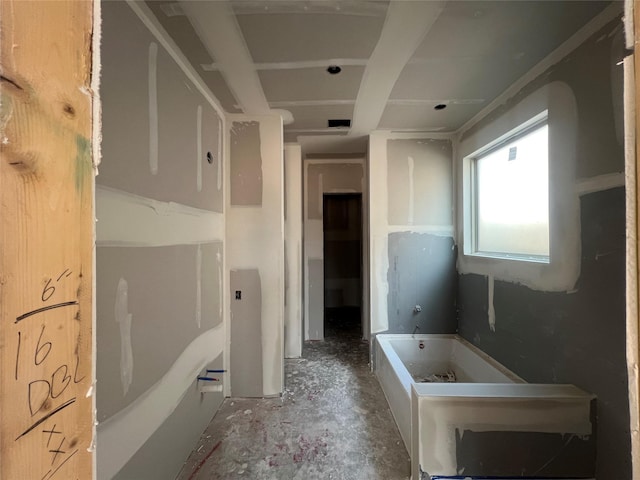 2227 Inglenook Grove Dr, Katy, TX 77493 - bathroom featuring a bathtub and concrete flooring