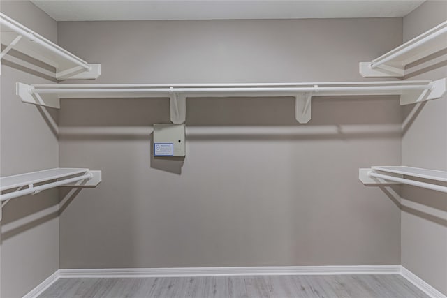 3626 Liles Ln, Humble, TX 77396 - walk in closet featuring wood finished floors