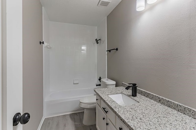 3626 Liles Ln, Humble, TX 77396 - full bath featuring toilet, wood finished floors, vanity, and bathtub / shower combination