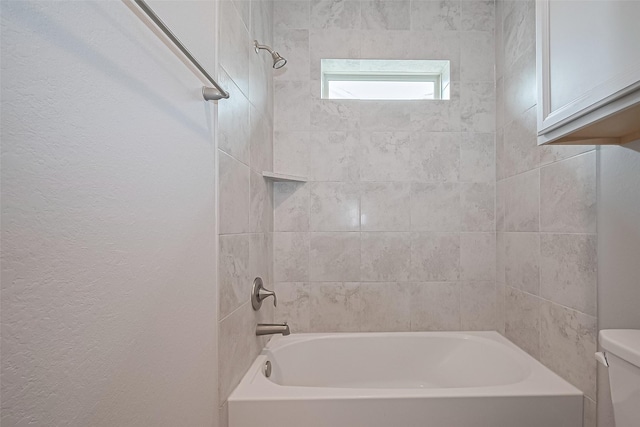 2022 Tarfite Pl, Houston, TX 77077 - bathroom with toilet, shower / bath combination, and a textured wall