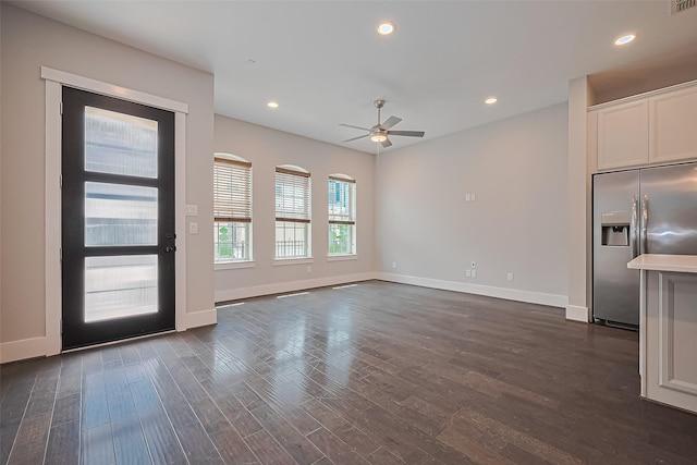 2022 Tarfite Pl, Houston, TX 77077 - unfurnished living room with baseboards, dark wood-type flooring, ceiling fan, and recessed lighting