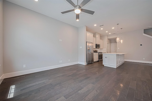 2022 Tarfite Pl, Houston, TX 77077 - kitchen with appliances with stainless steel finishes, baseboards, dark wood-style floors, and recessed lighting