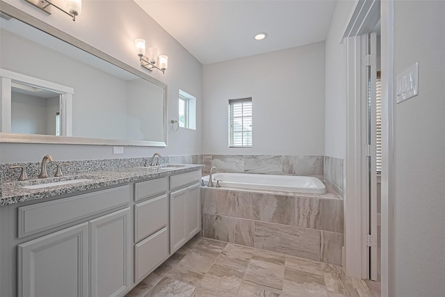 2022 Tarfite Pl, Houston, TX 77077 - bathroom featuring a bath and double vanity