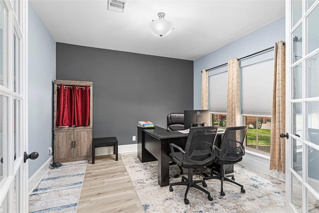 16714 Radiant Lilac Trl, Cypress, TX 77433 - office area featuring french doors, wood finished floors, and baseboards