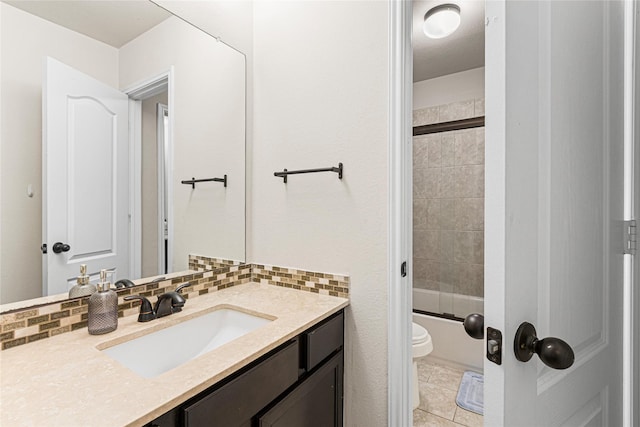 16714 Radiant Lilac Trl, Cypress, TX 77433 - bathroom featuring vanity, toilet, tasteful backsplash, shower / bath combination, and tile patterned flooring