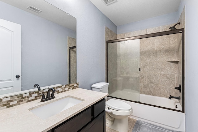 16714 Radiant Lilac Trl, Cypress, TX 77433 - bathroom featuring toilet, vanity, enclosed tub / shower combo, and backsplash