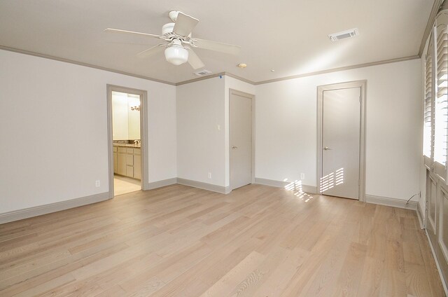 6 River Hollow Ln, Houston, TX 77027 - unfurnished room featuring light wood-style floors, a ceiling fan, ornamental molding, and baseboards
