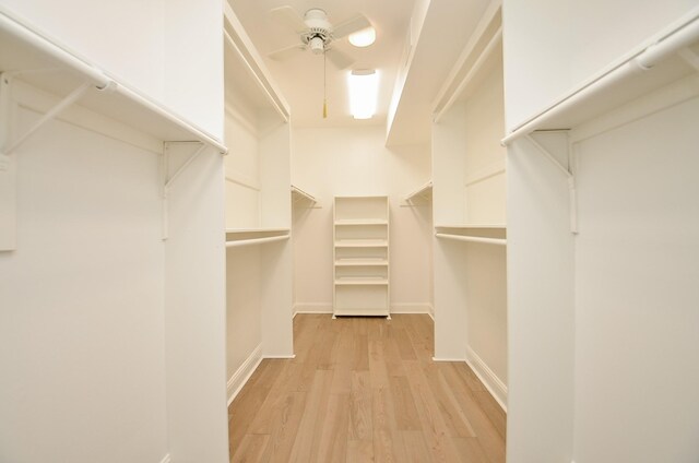 6 River Hollow Ln, Houston, TX 77027 - spacious closet with light wood finished floors