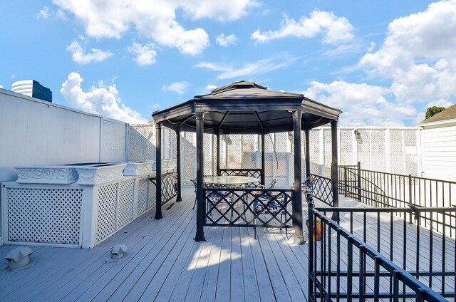 6 River Hollow Ln, Houston, TX 77027 - wooden deck with a gazebo