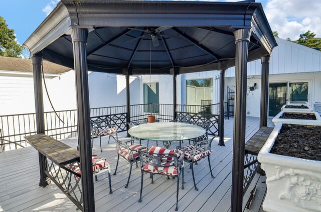 6 River Hollow Ln, Houston, TX 77027 - deck featuring a gazebo and outdoor dining space