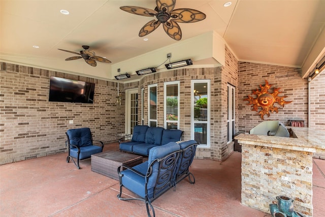 25607 Ryans Creek Ct, Katy, TX 77494 - view of patio featuring area for grilling, ceiling fan, and an outdoor living space