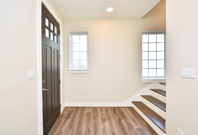 5525 Petty St Unit A, Houston, TX 77007 - foyer featuring wood finished floors, baseboards, stairway, and recessed lighting