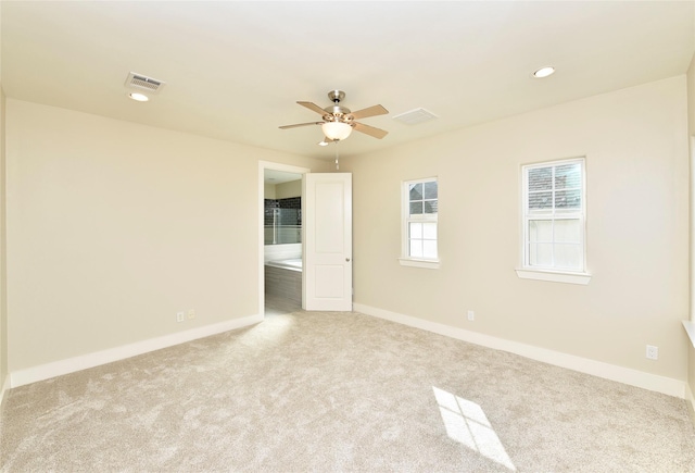 5525 Petty St Unit A, Houston, TX 77007 - carpeted spare room with baseboards, ceiling fan, and recessed lighting