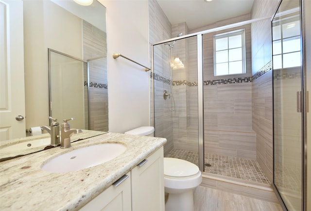 5525 Petty St Unit A, Houston, TX 77007 - bathroom with toilet, vanity, and a stall shower