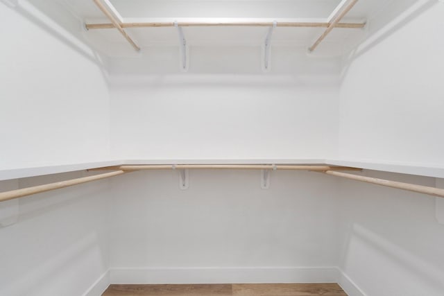 821 Empire St, El Campo, TX 77437 - spacious closet featuring light wood-type flooring
