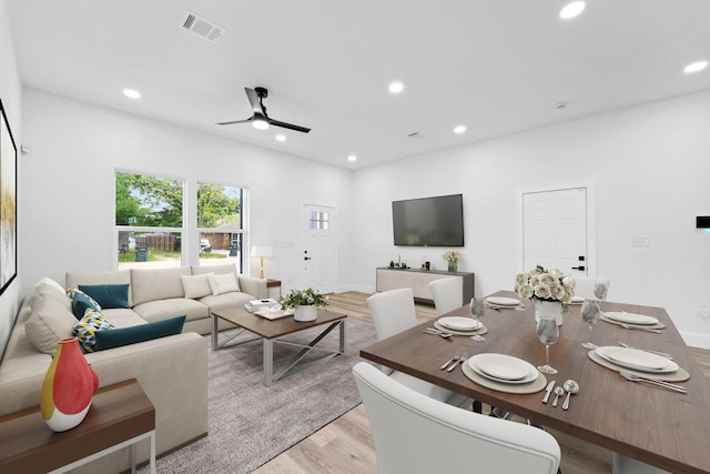 821 Empire St, El Campo, TX 77437 - living room featuring ceiling fan, plenty of natural light, light wood-style floors, and recessed lighting