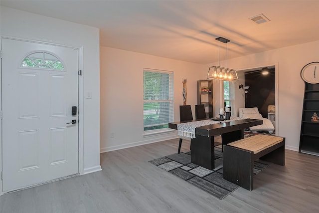 12602 Westleigh Dr, Houston, TX 77077 - dining space with wood finished floors, plenty of natural light, baseboards, and an office area