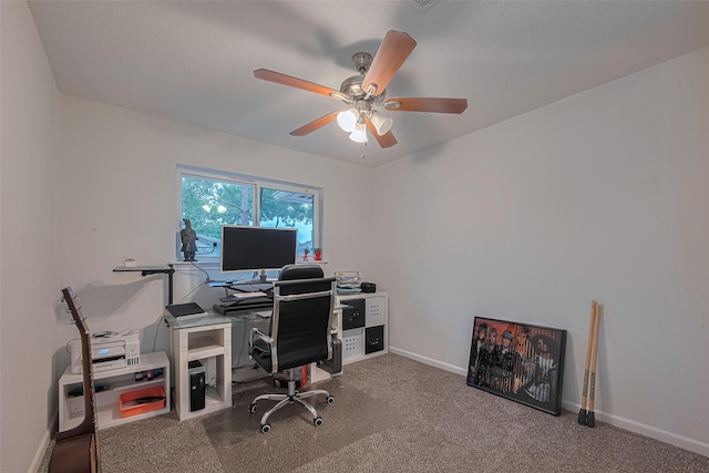 12602 Westleigh Dr, Houston, TX 77077 - carpeted home office with a ceiling fan and baseboards