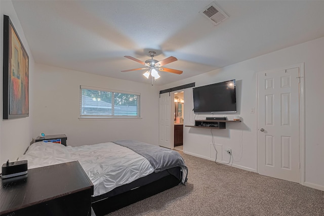 12602 Westleigh Dr, Houston, TX 77077 - bedroom featuring light carpet and a ceiling fan