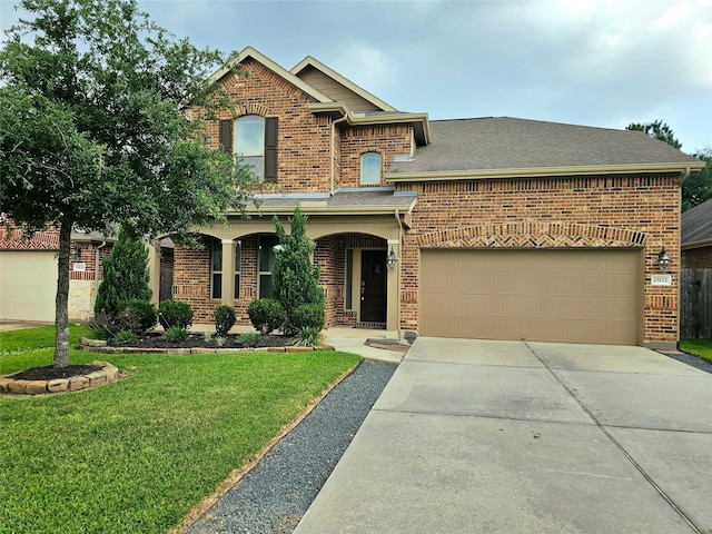 23122 Biddle Dr, Porter, TX 77365 - traditional-style house featuring brick siding, a front yard, concrete driveway, and a shingled roof
