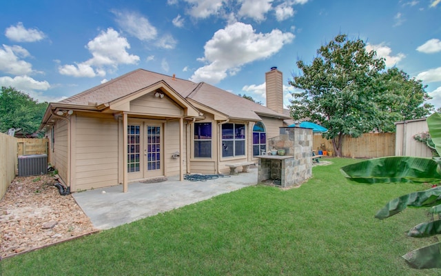 3359 Tenaha Dr, Houston, TX 77014 - rear view of property featuring cooling unit, a chimney, and a patio area