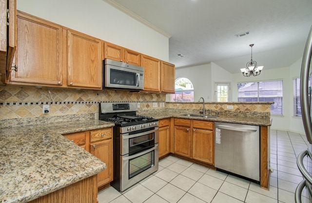 3359 Tenaha Dr, Houston, TX 77014 - kitchen featuring appliances with stainless steel finishes, a sink, a peninsula, light tile patterned flooring, and tasteful backsplash