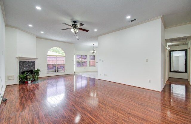 3359 Tenaha Dr, Houston, TX 77014 - unfurnished living room with crown molding, a ceiling fan, wood finished floors, a chandelier, and recessed lighting