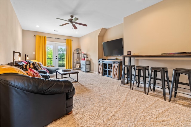 2509 Creektrail Ln, Richmond, TX 77406 - carpeted living area with french doors, a ceiling fan, and baseboards