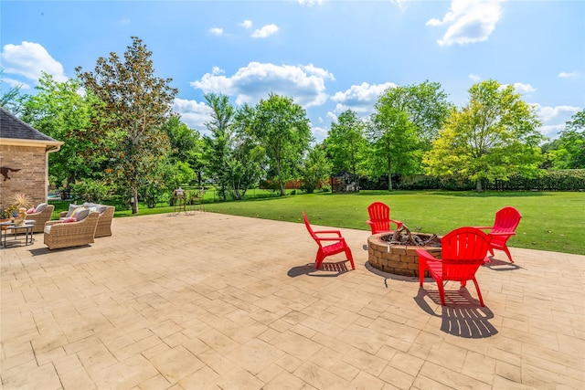 2509 Creektrail Ln, Richmond, TX 77406 - view of patio featuring a fire pit and view of wooded area