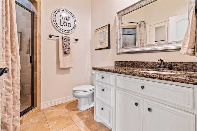 2509 Creektrail Ln, Richmond, TX 77406 - full bath featuring a shower stall, toilet, vanity, and baseboards
