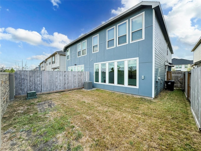 5667 Foggy Vine Ct, Fulshear, TX 77441 - back of house with central AC