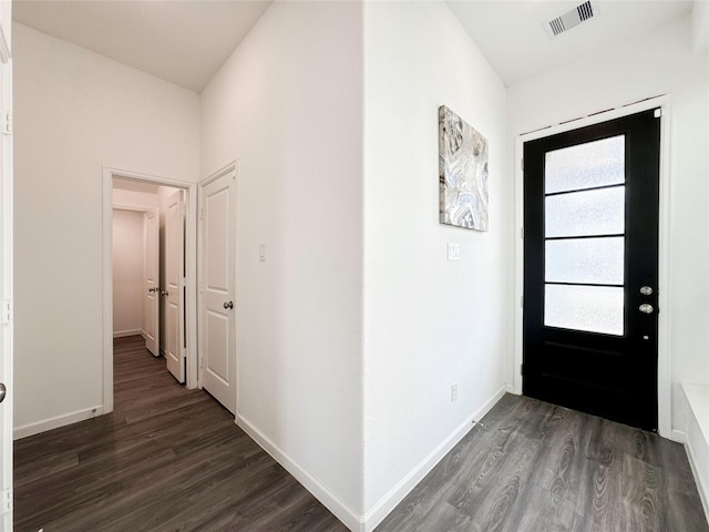 5667 Foggy Vine Ct, Fulshear, TX 77441 - entrance foyer with dark wood finished floors and baseboards