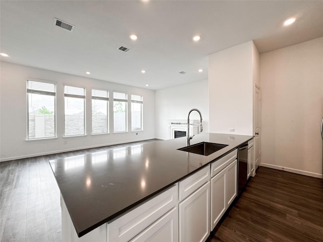5667 Foggy Vine Ct, Fulshear, TX 77441 - kitchen with a sink, dishwasher, dark wood-style floors, open floor plan, and recessed lighting