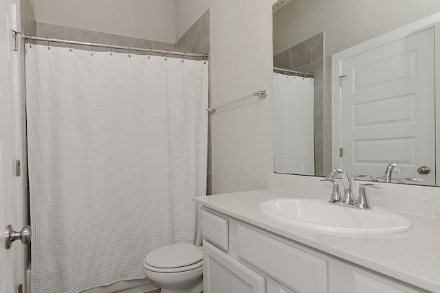 2205 Salt Grass Trl, Conroe, TX 77384 - full bathroom featuring vanity, toilet, and a shower with shower curtain