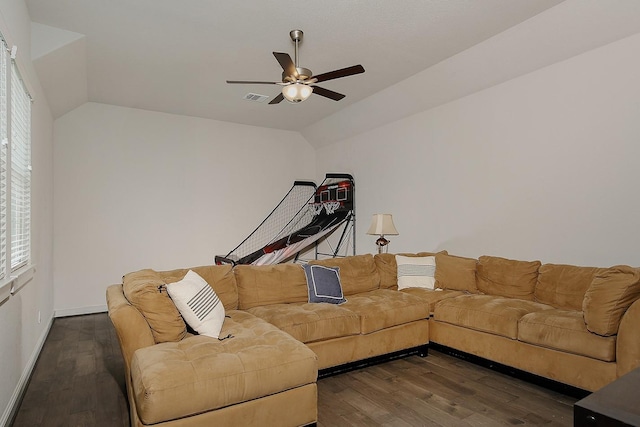 2205 Salt Grass Trl, Conroe, TX 77384 - living room featuring lofted ceiling, wood finished floors, ceiling fan, healthy amount of natural light, and baseboards