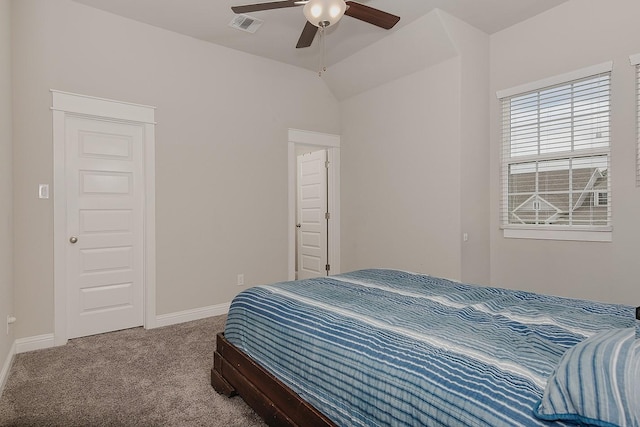 2205 Salt Grass Trl, Conroe, TX 77384 - carpeted bedroom featuring lofted ceiling, baseboards, and ceiling fan